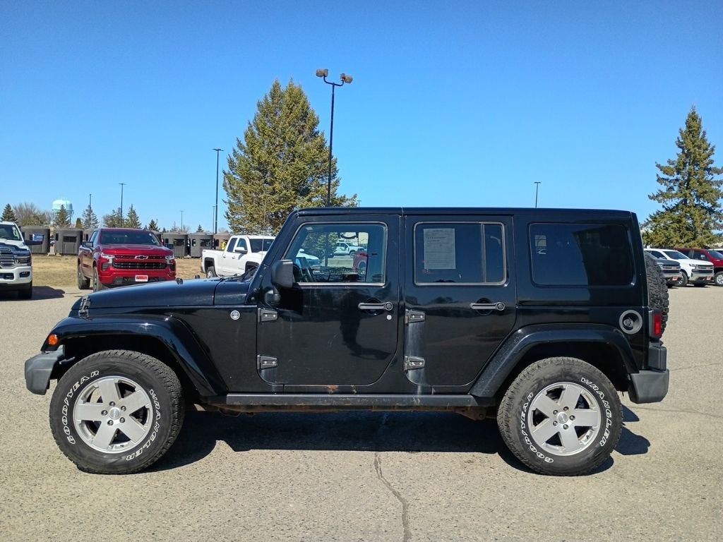 Used 2012 Jeep Wrangler Unlimited Sahara with VIN 1C4BJWEG7CL248859 for sale in Grand Rapids, Minnesota