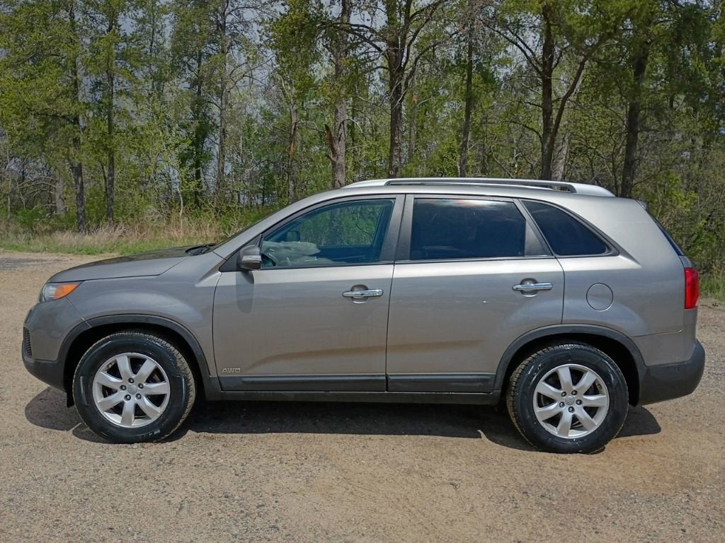 Used 2013 Kia Sorento LX with VIN 5XYKTDA2XDG336245 for sale in Grand Rapids, Minnesota