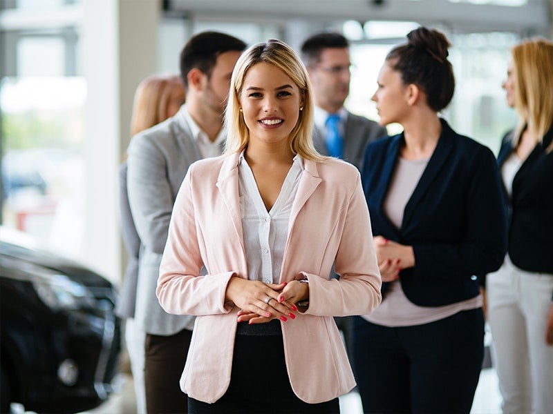 women standing in office