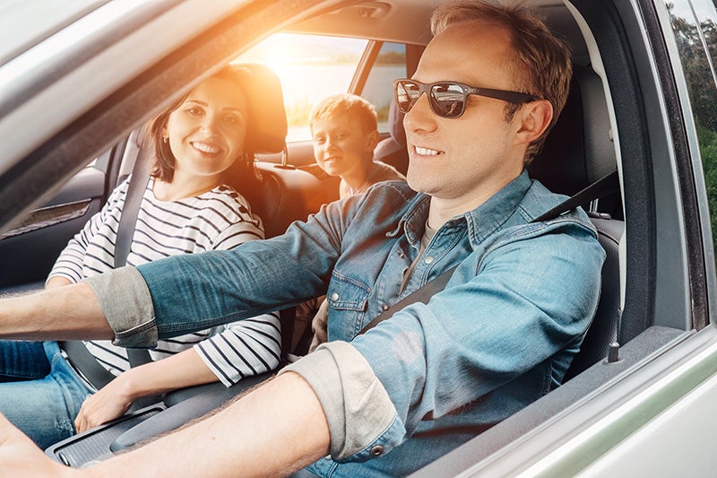 Family enjoying a car ride in a certified pre-owned vehicle